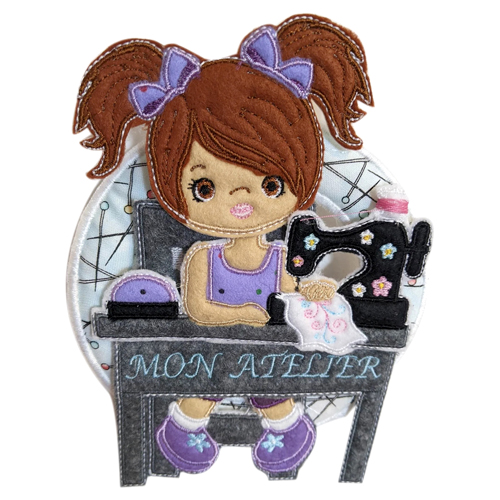 Crafting Dreams: ITH Embroidery Design of a Girl with Sewing Machine in her Workshop